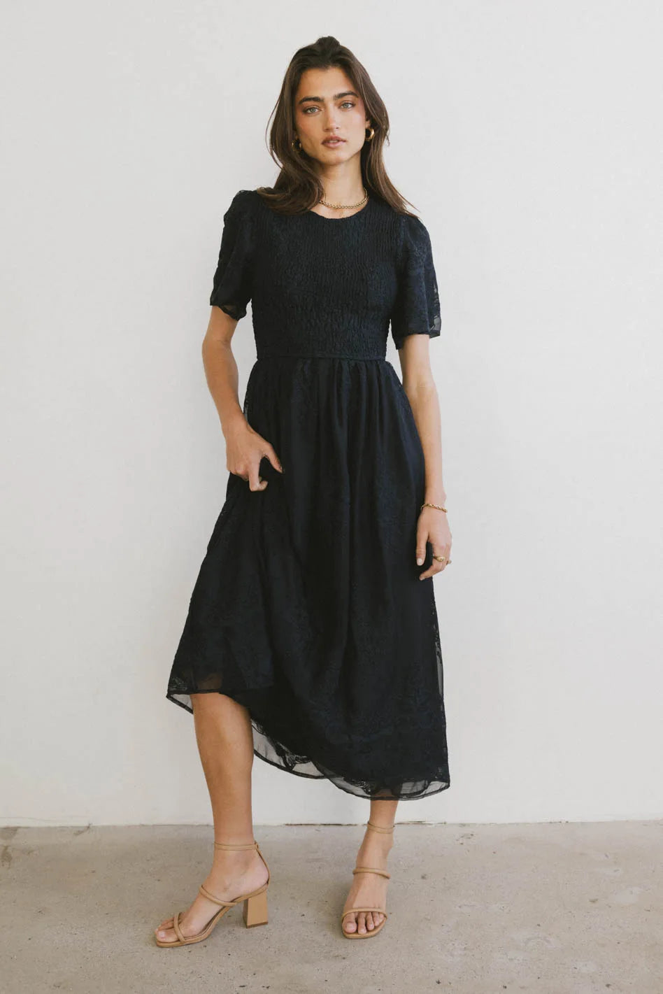 Midi dresses with pleated skirts for a timeless and elegant appeal Alora Embroidered Dress in Navy Midi dresses with pleated skirts for a timeless and elegant appeal Alora Embroidered Dress in Navy