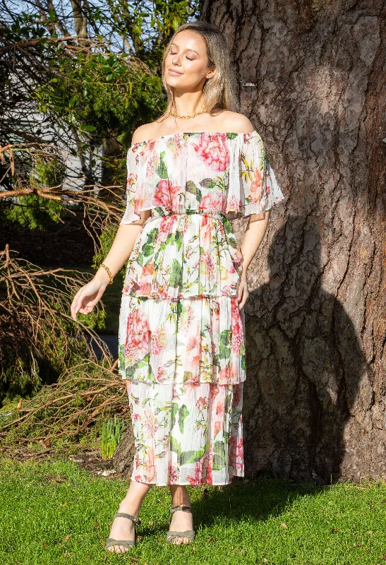 Midi dresses with pom - pom trims for a playful and festive look Tiered Floral Midi Dress Midi dresses with pom - pom trims for a playful and festive look Tiered Floral Midi Dress