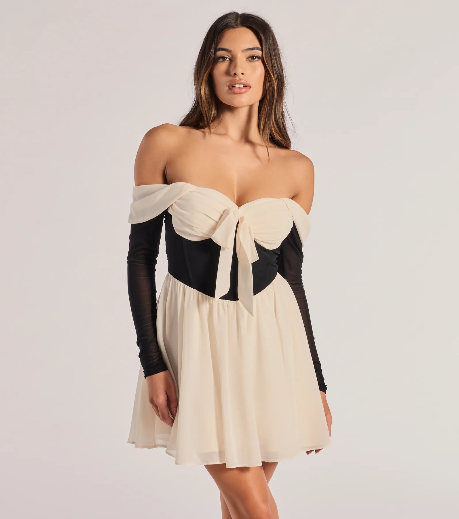 Mini dresses with tassel accents for a fun touch Perfectly Chic Bow Detail Off-The-Shoulder Skater Dress Mini dresses with tassel accents for a fun touch Perfectly Chic Bow Detail Off-The-Shoulder Skater Dress