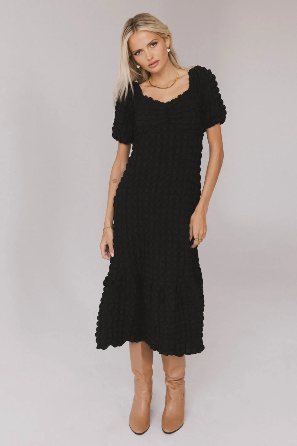 Midi dresses with ruffled sleeves for a more feminine and voluminous look Miley Bubble Texture Dress in Black Midi dresses with ruffled sleeves for a more feminine and voluminous look Miley Bubble Texture Dress in Black