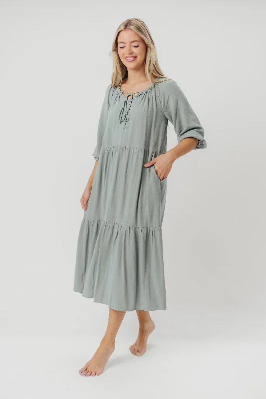 Midi dresses with abstract art prints for an artistic statement Avery Tiered Linen-Blend Midi Dress in Sage - Bump Friendly and Inclusive Sizing
