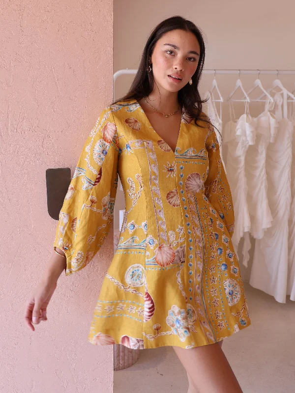 Mini dresses with fringe for a bohemian style Roame Cassandra Dress in Marigold