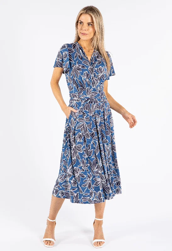 Midi dresses with pleated bodices for a classic and tailored look Floral Tropic Print Dress