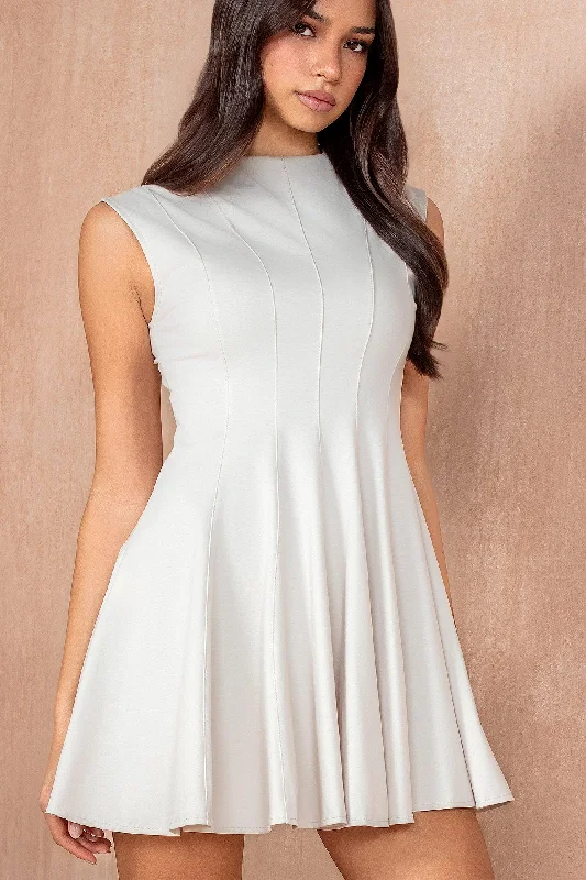 Mini dresses with criss - cross backs for a flirty look Kaiden Stone Pleated Dress