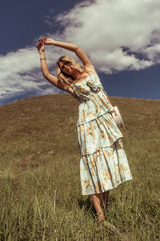 Midi dresses with ruffled sleeves for a more feminine and voluminous look Ava Floral Midi Dress in Sage - FINAL SALE