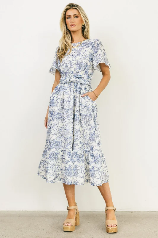 Midi dresses with pom - pom trims for a playful and festive look Theresa Floral Midi Dress