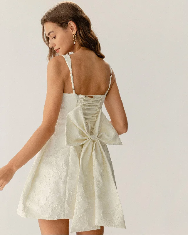 Mini dresses with side slits for a sexy appeal White Textured Bowknot Slip Mini Dresses