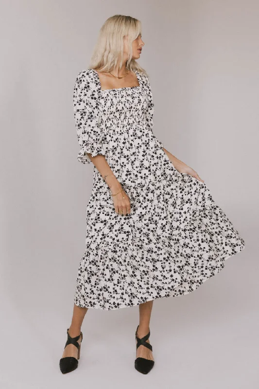 Midi dresses with ruched sleeves for a more fitted and stylish arm look Kiran Floral Midi Dress in Cream