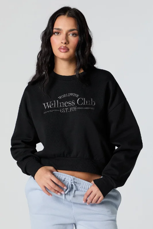 Women's oversized cropped hoodie with drawstrings for a trendy lookWellness Club Embroidered Cropped Fleece Sweatshirt Women's oversized cropped hoodie with drawstrings for a trendy lookWellness Club Embroidered Cropped Fleece Sweatshirt