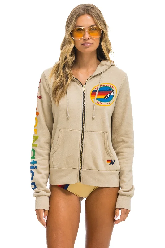 Women's hoodie with a glittery print for a glamorous and sparkly appearanceAVIATOR NATION HOODIE - SAND Women's hoodie with a glittery print for a glamorous and sparkly appearanceAVIATOR NATION HOODIE - SAND