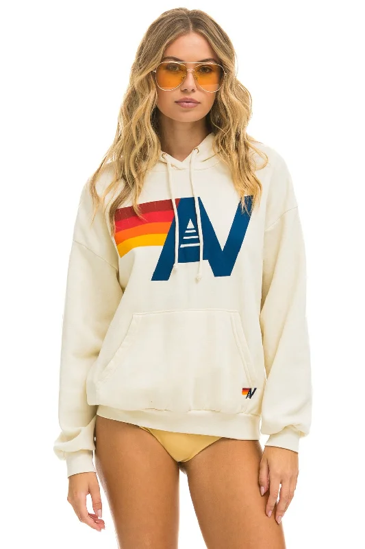 Women's graphic - printed sweatshirt featuring floral patterns for a feminine touchLOGO PULLOVER RELAXED HOODIE - VINTAGE WHITE Women's graphic - printed sweatshirt featuring floral patterns for a feminine touchLOGO PULLOVER RELAXED HOODIE - VINTAGE WHITE