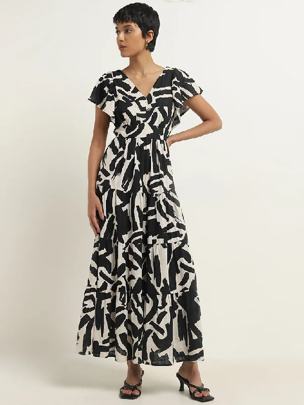 Little Black Women Dress with Sequins for a Glamorous Night Out Little Black Women Dress with Sequins for a Glamorous Night Out LOV Black Abstract Printed Tiered Dress