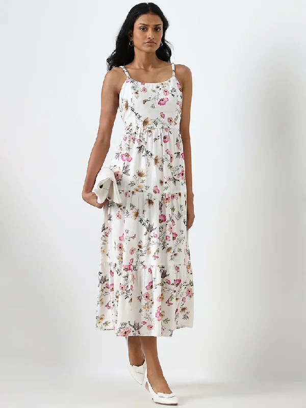 Printed Abstract Women Dress for a Modern and Artistic Appeal Printed Abstract Women Dress for a Modern and Artistic Appeal LOV White Floral Printed Linen Blend Tiered Dress