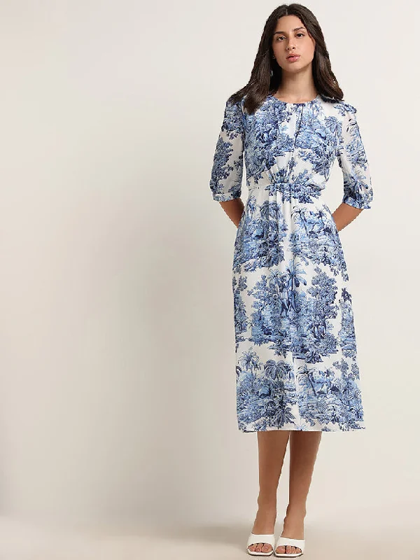 Backless Women Dress for a Sexy and Alluring Look at Evening Events Backless Women Dress for a Sexy and Alluring Look at Evening Events Wardrobe Ivory & Blue Foliage Printed Straight Dress