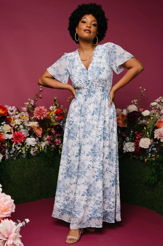 Maxi dresses with pom - pom trims for a playful and festive lookBirdie Maxi Dress | Off White + Blue Maxi dresses with pom - pom trims for a playful and festive lookBirdie Maxi Dress | Off White + Blue
