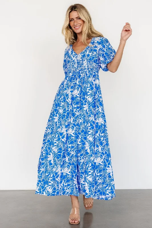 Maxi dresses with tassel accents for a fun and lively touchElaine Maxi Dress | Blue + White Maxi dresses with tassel accents for a fun and lively touchElaine Maxi Dress | Blue + White