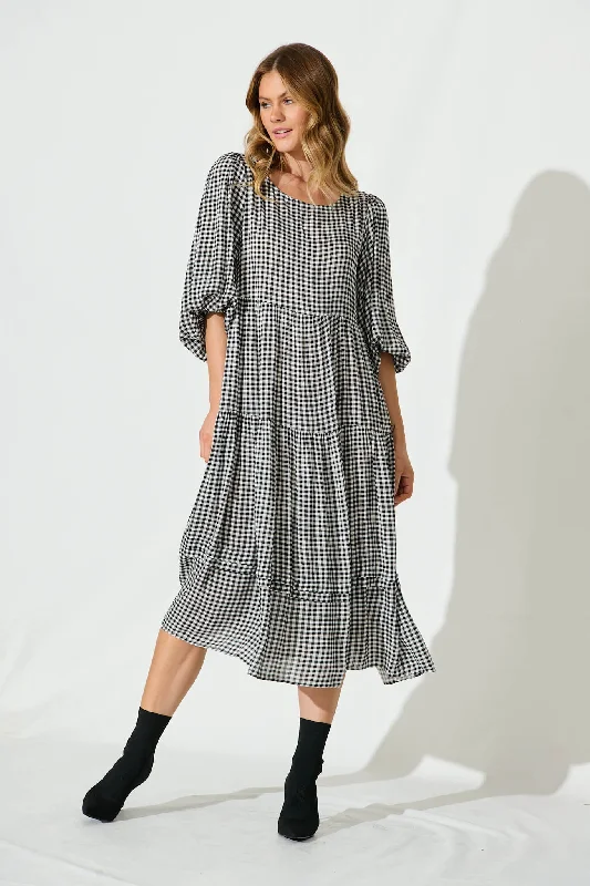 Midi dresses with tiered skirts for a bohemian festival lookAlberta Smock Dress In Black Gingham Check