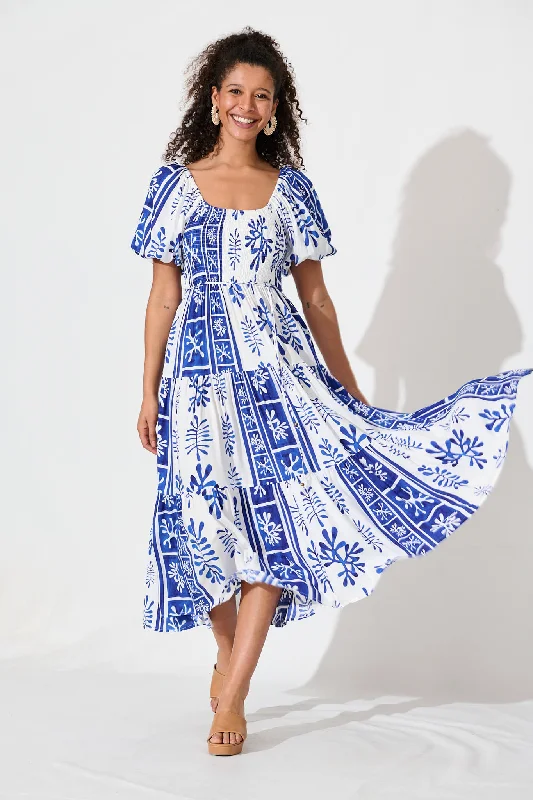 Midi dresses with tiered skirts for a bohemian festival lookButterfly Midi Dress In Cobalt With White Print Midi dresses with tiered skirts for a bohemian festival lookButterfly Midi Dress In Cobalt With White Print