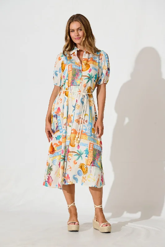 Midi dresses with ruffled hems for a romantic date nightDearest Midi Shirt Dress In Cream With Multi Summer Print