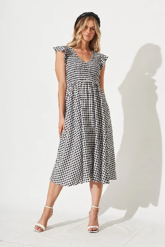 Midi dresses with puff sleeves for a vintage - inspired lookJeannie Midi Dress In Black Gingham