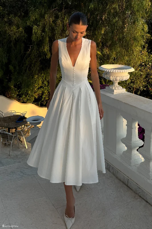 Midi dresses with gathered skirts for a full and flowing silhouetteKeely Cotton Sleeveless Midi Dress - White
