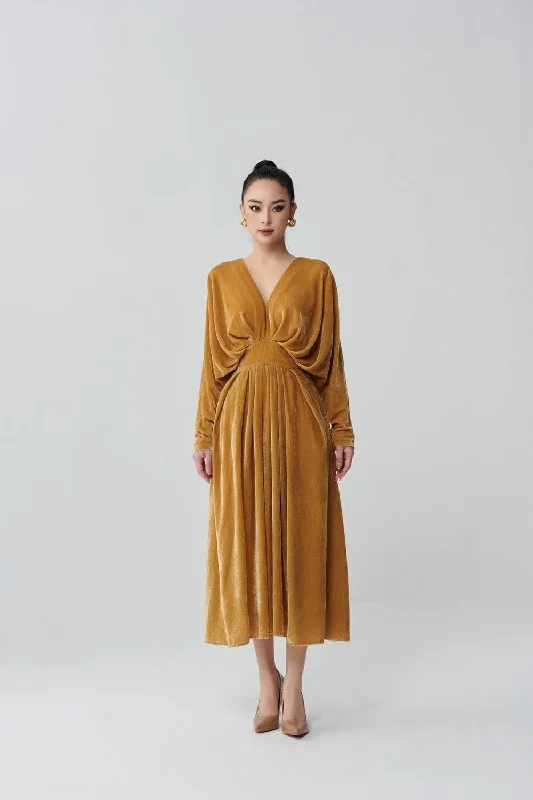Midi dresses with animal prints for a bold and confident appearanceKimo Gathered V-Neck Velvet Midi Dress
