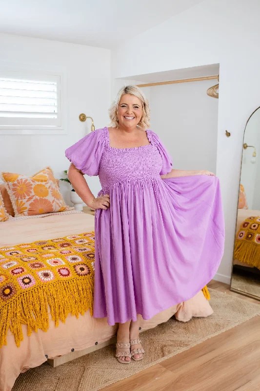 Midi dresses with polka dot prints for a playful summer outfitStelle Linen Blend Midi Dress in Berry