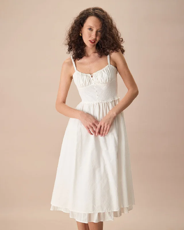Midi dresses with ribbed textures for a unique and tactile appearanceThe White Ruched Slip Cotton Midi Dress