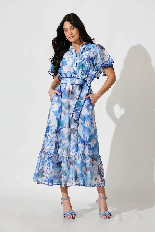 Midi dresses with keyhole backs for a flirty and unexpected detailYuki Midi Dress in Blue Multi Floral