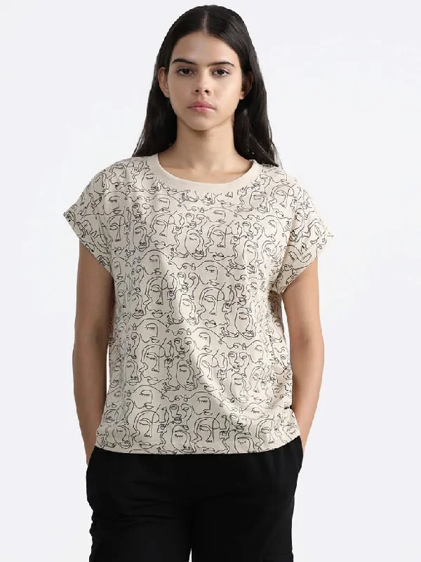 Women's pants for music festivals Ripped women jeans for a rebellious and fashion - forward style Studiofit Cream Face Printed Cotton T-Shirt Women's pants for music festivals Ripped women jeans for a rebellious and fashion - forward style Studiofit Cream Face Printed Cotton T-Shirt