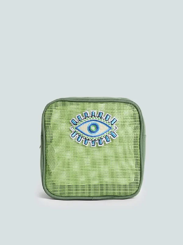 Women's low - rise denim pants Distressed women jeans for a trendy and edgy look Studiowest Evil Eye Green Mesh Pouch