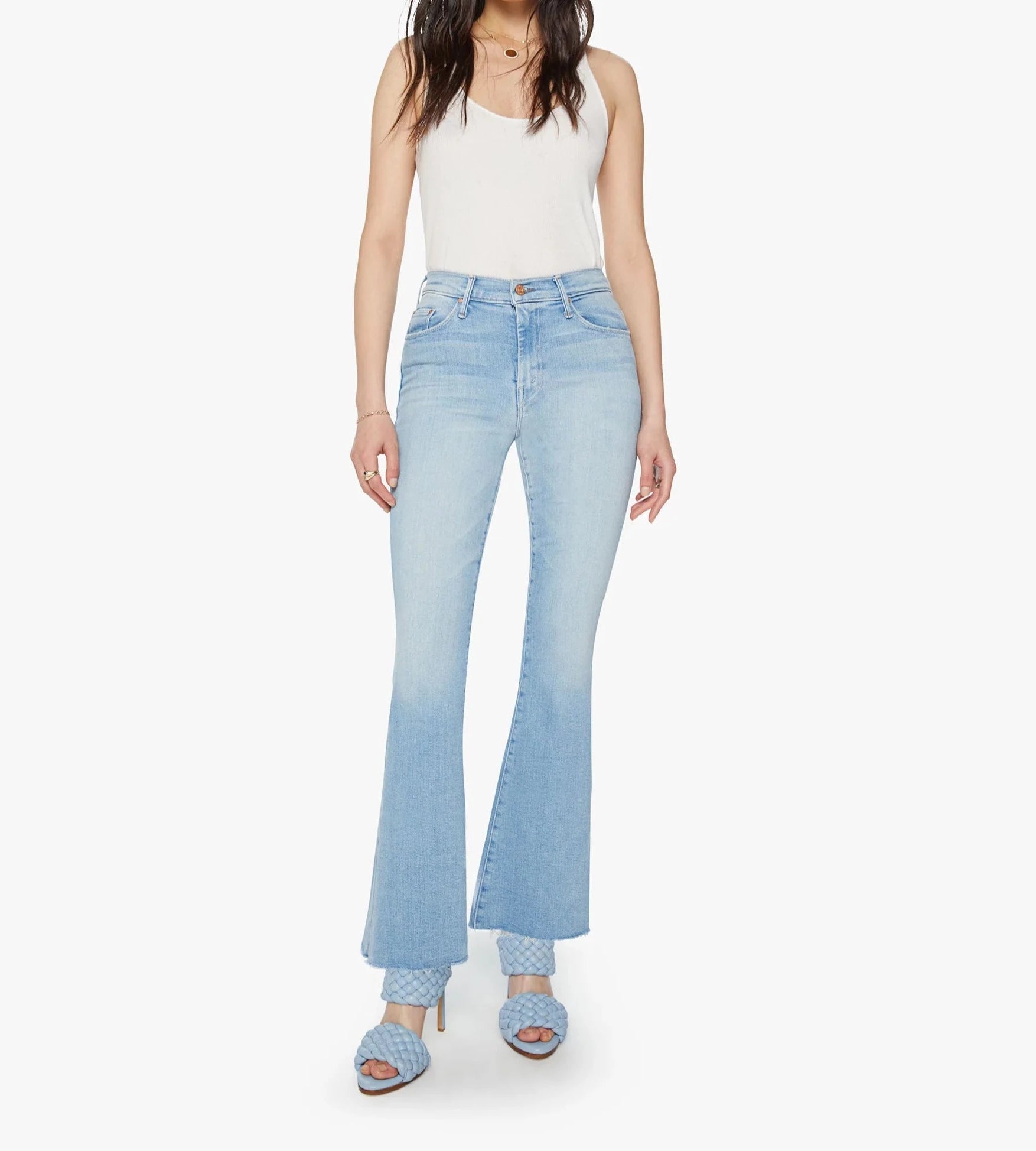 Women's pants for music festivals Ripped women jeans for a rebellious and fashion - forward style MOTHER DENIM THE WEEKENDER FRAY