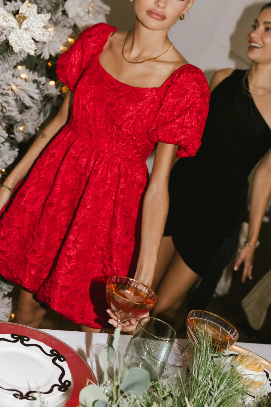 Mini dresses with tassel accents for a fun touchAisling Bubble Mini Dress in Red