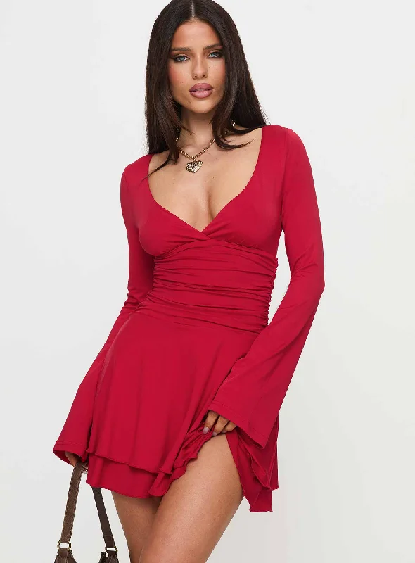 Mini dresses with asymmetric hems for a fashion - forward lookCanino Long Sleeve Mini Dress Red