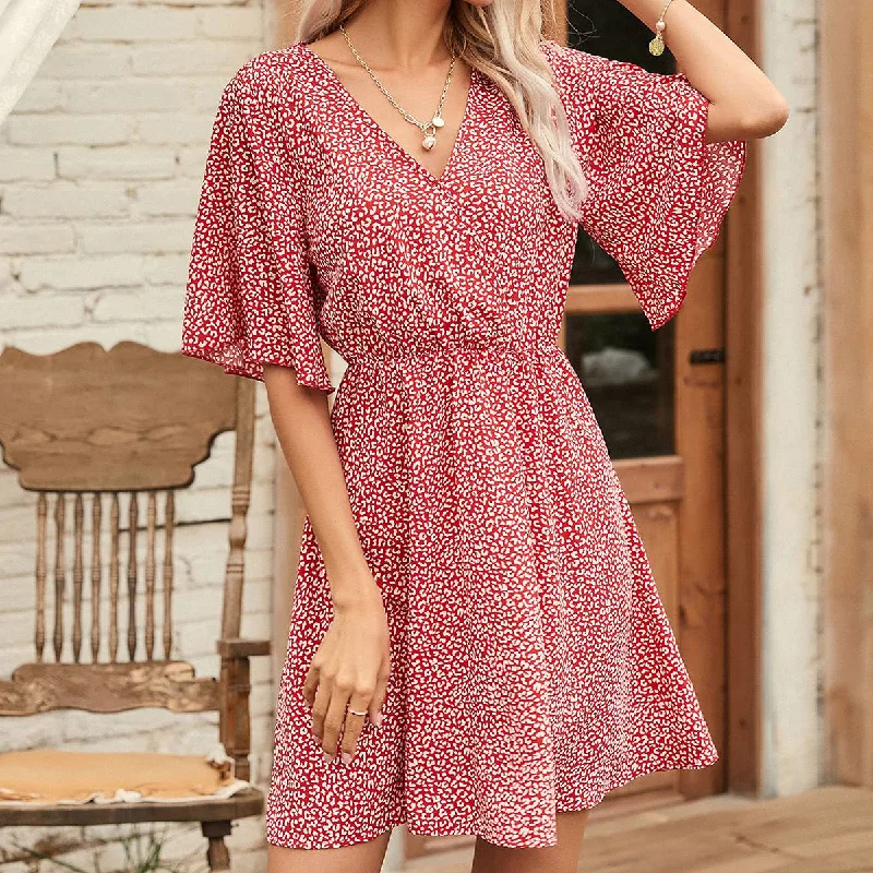 Denim mini dresses with distressed detailsJora Spotted Wrap Dress