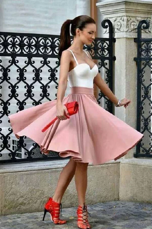 Party dresses with a criss - cross back design for a stylish detail​A-Line Spaghetti Straps Knee-Length Blush Homecoming Dress with Pleats PD214