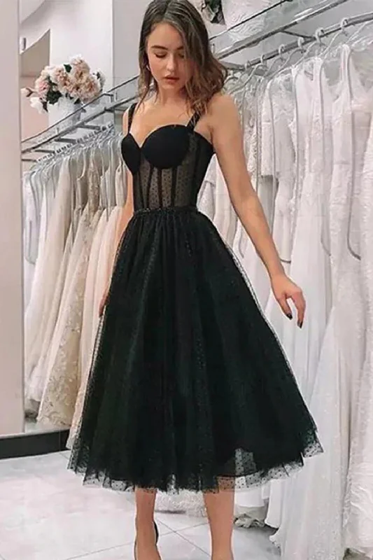 Short - length party dresses with a ruffled skirt for a flirty look​Black Polka Dots A Line Prom Dress