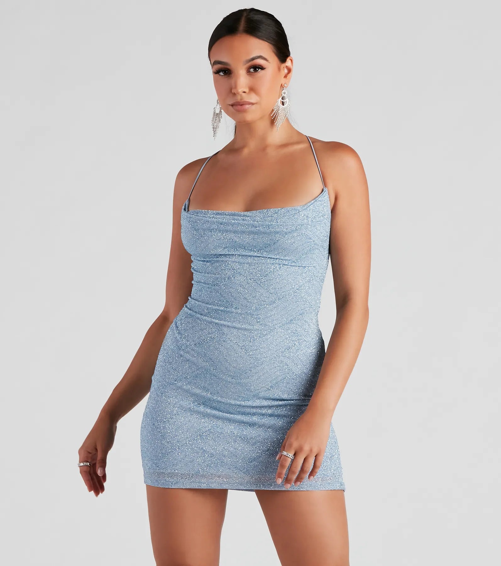 Sheer cocktail dresses with a lining and a short hemKindra Formal X-Back Glitter Bodycon Dress
