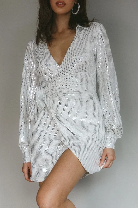 Lace - trimmed cocktail dresses in a pastel color for a soft appearanceWhite Sequin V-Neck Wrapped Mini Dress