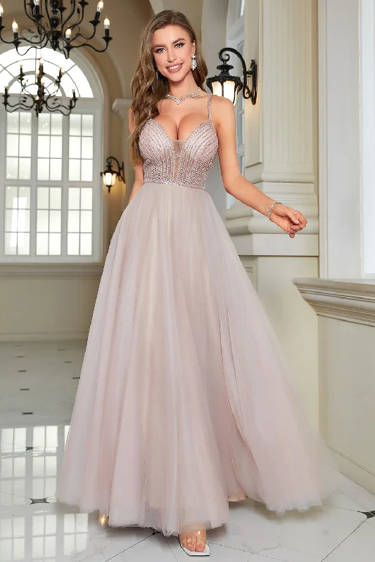 Party dresses with a leatherette material for a tough and stylish appearance​Sparkly Blush Beaded A-Line Long Formal Dress