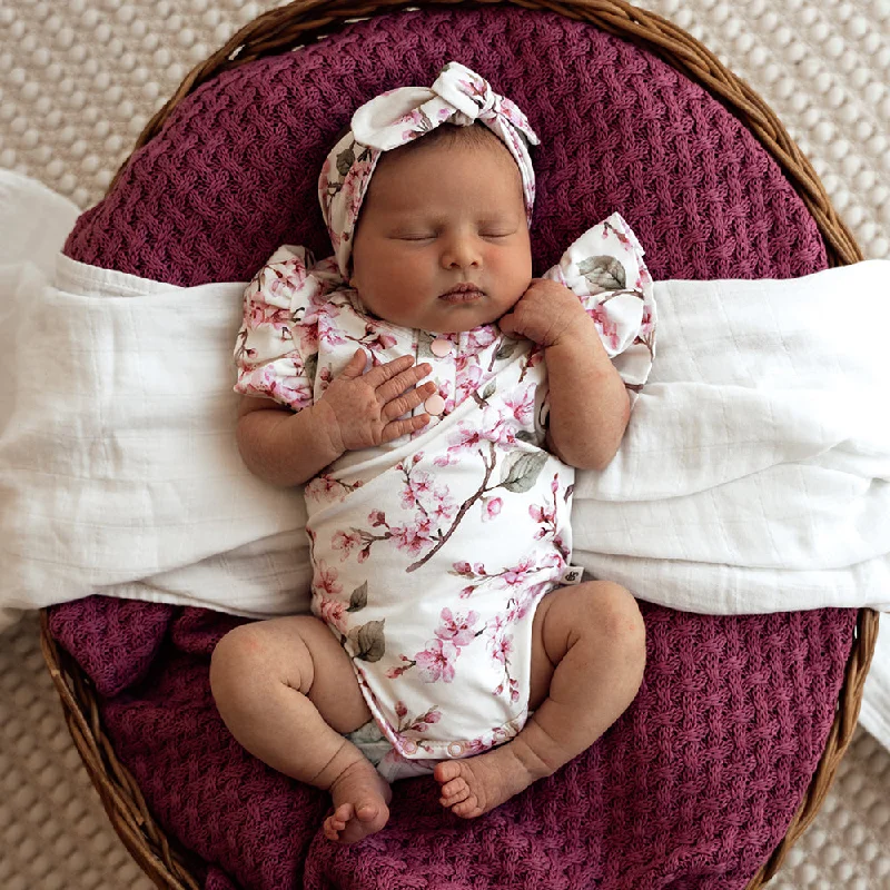 Cut - Out Bodysuits for a Trendy and Fashion - Forward StyleCherry Blossom Short Sleeve Organic Bodysuit with Frill