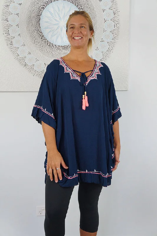 Thermal - lined cover ups for cooler beach eveningsEmbroidered Swing Top