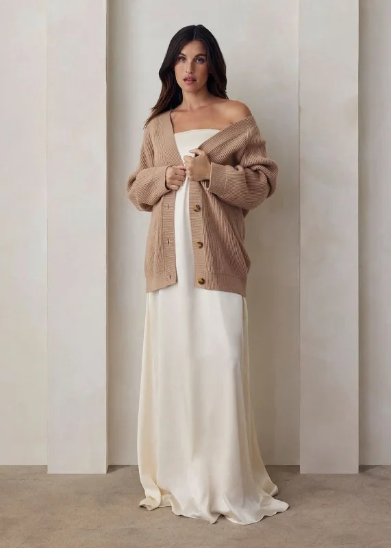 Ruffled Bodysuits with a Playful and Feminine TouchCozy Knit Ribbed Cardigan